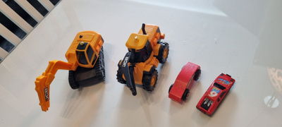 Kaivikoneita + autoja