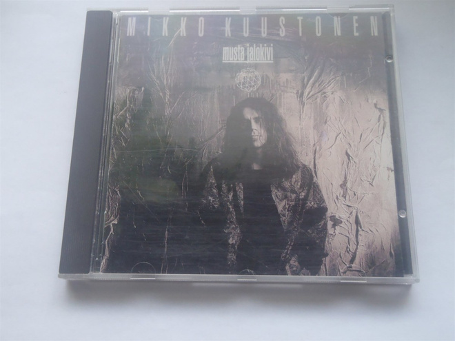 MIKKO KUUSTONEN - MUSTA JALOKIVI . cd ( Hyvä kunto )