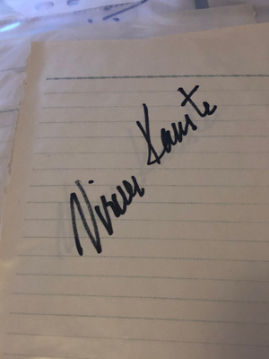 Virve Kauste nimikirjoitus paperilla