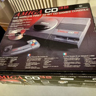 Amiga CD32 -konsoli + pack-in pelit yms. (CIB) - pikkukuva 1
