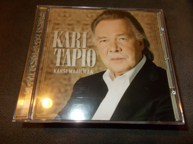 CD KARI TAPIO ** KAKSI MAAILMAA **