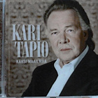 KARI TAPIO: KAKSI MAAILMAA - pikkukuva 1
