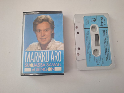 MARKKU ARO - SUOJASSA SAMAN AURINGON c-kasetti ( FK 5110 )