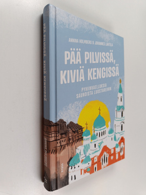 Annina Holmberg ym. : Pää pilvissä, kiviä kengissä - pyhi...