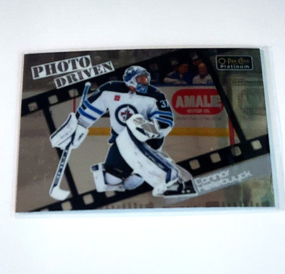 2023-24 OPC Platinum Photo Driven #10 Connor Hellebuyck