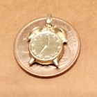 Kello riipus 18K - pikkukuva 1