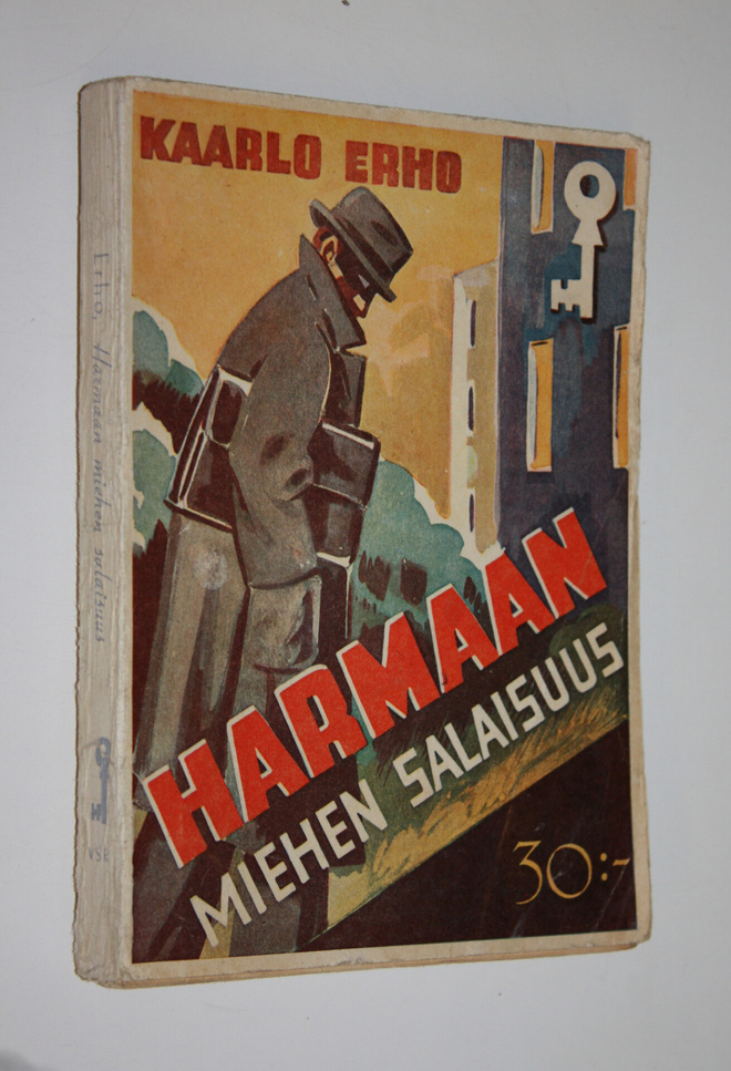 Kaarlo Erho : Harmaan miehen salaisuus : salapoliisiromaani
