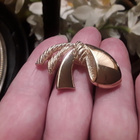 NÄYTTÄVÄ CHRISTIAN DIOR RINTAKORU. VINTAGE PUKUKORU. - pikkukuva 1