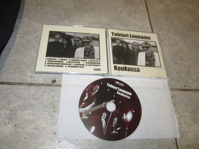 Tohtori Lounamo – Koukussa : CD v 2010