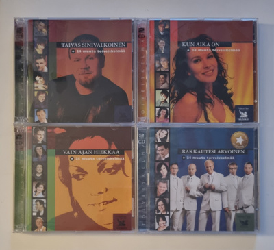 4 KPL "+ 24 MUUTA TOIVEISKELMÄÄ" CD-LEVYJÄ
