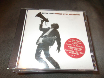 CD BRYAN ADAMS ** WAKING UP THE NEIGBOURS **