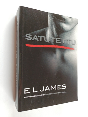E. L. James : Satutettu : fifty shades darker Christianin...