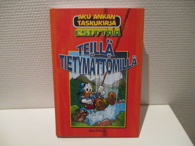 Aku Ankan taskukirja esittää Teillä tietymättömillä