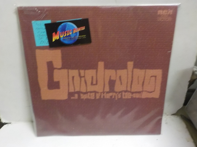 GNIDROLOG - ...IN SPITE OF HARRY'S TOE-NAIL - EX/EX+ LP