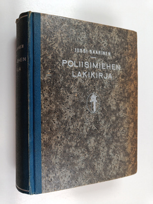 Jussi Saarinen : Poliisimiehen lakikirja