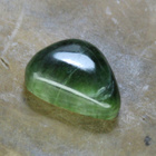 Outokumpu kromidiopsidi pyörtöhiottu 31.23 karaattia / 22 mm - pikkukuva 1