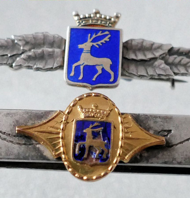 Åland: Rintamerkki ja solmioneula