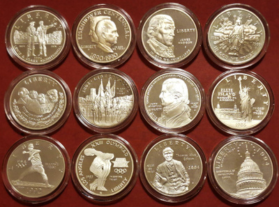 12 x 1 dollar (900) hopea rahoja - hopean hinnalla.