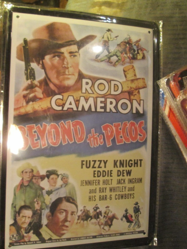 Peltikyltti Beyond the Pecos. Elokuvamainos