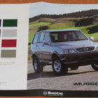 2001 Ssang Yong Musso 4x4 esite - KUIN UUSI - 12 sivua - pikkukuva 1