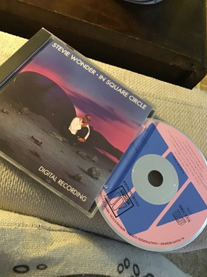 Stevie Wonder . In square circle CD