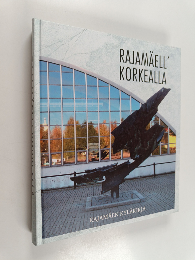 Rajamäell' korkealla : Rajamäen kyläkirja