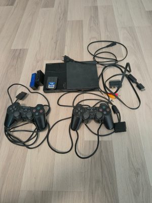 PlayStation 2- slim + pelejä ja tarvikkeita