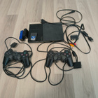 PlayStation 2- slim + pelejä ja tarvikkeita - pikkukuva 1