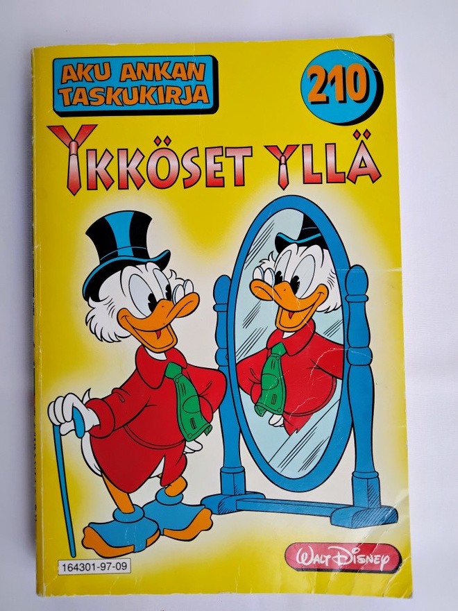 Ykköset yllä - Aku Ankka taskukirja 210