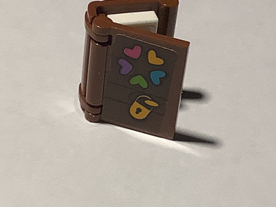 Lego Friends päiväkirja ja 1x2 laata sisällä