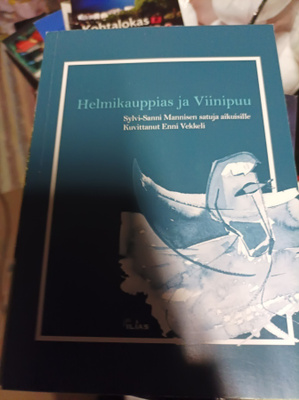 S.S Manninen Helmikauppias ja viinipuu