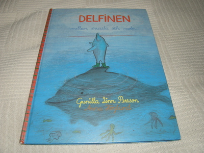 Persson - Höglund Delfinen mellan mussla och moln
