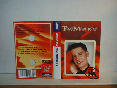 Tomi Markola * T M