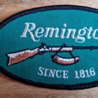 Remington aseet vintage kangasmerkki - pikkukuva 1