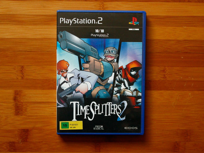 TimeSplitters 2 PS2-peli + ohjekirja
