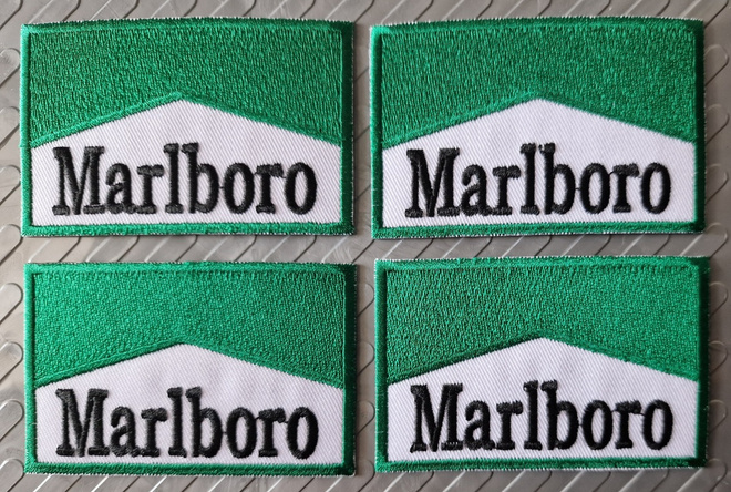 4 kpl Green Marlboro kangasmerkkejä  8e/setti tai 2.5e/kpl.