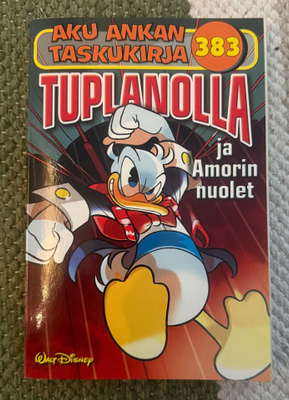 AKU ANKAN TASKUKIRJA 383 - TUPLANOLLA JA AMORIN NUOLET