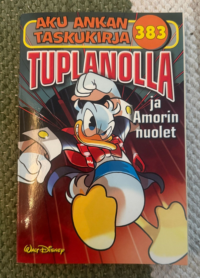 AKU ANKAN TASKUKIRJA 383 - TUPLANOLLA JA AMORIN NUOLET