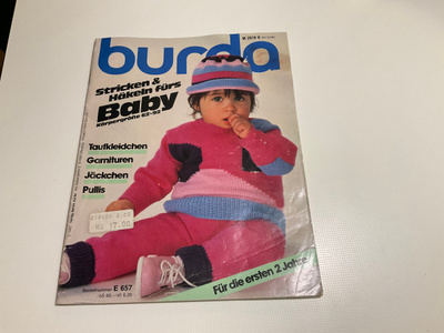 Burda vuodelta 2018, neuleita vauvoille. Mm. kastemekkoja
