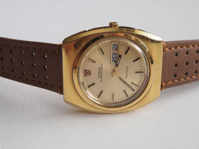 Omega Geneve Megaquartz 32 Khz,postikuluineen pakettina.