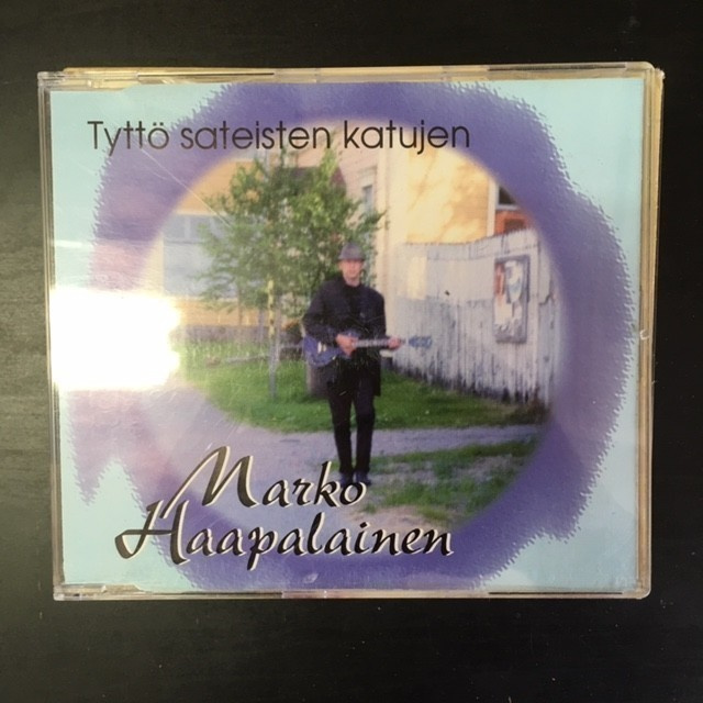Marko Haapalainen - Tyttö sateisten katujen CDS