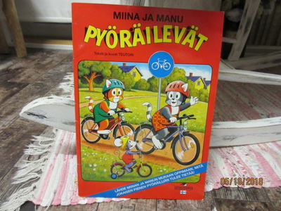 Miina ja Manu pyöräilevät.