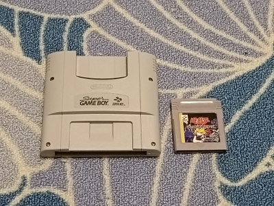 Super Game Boy Adapter + Peli Snes