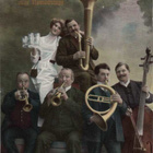 MUSIIKKI / Miesorkesteri ja kaunis nainen. 1900-l. - pikkukuva 1