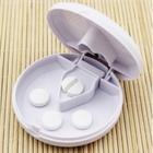 Pillerinpuolittaja ja pillerirasia samassa - pikkukuva 2