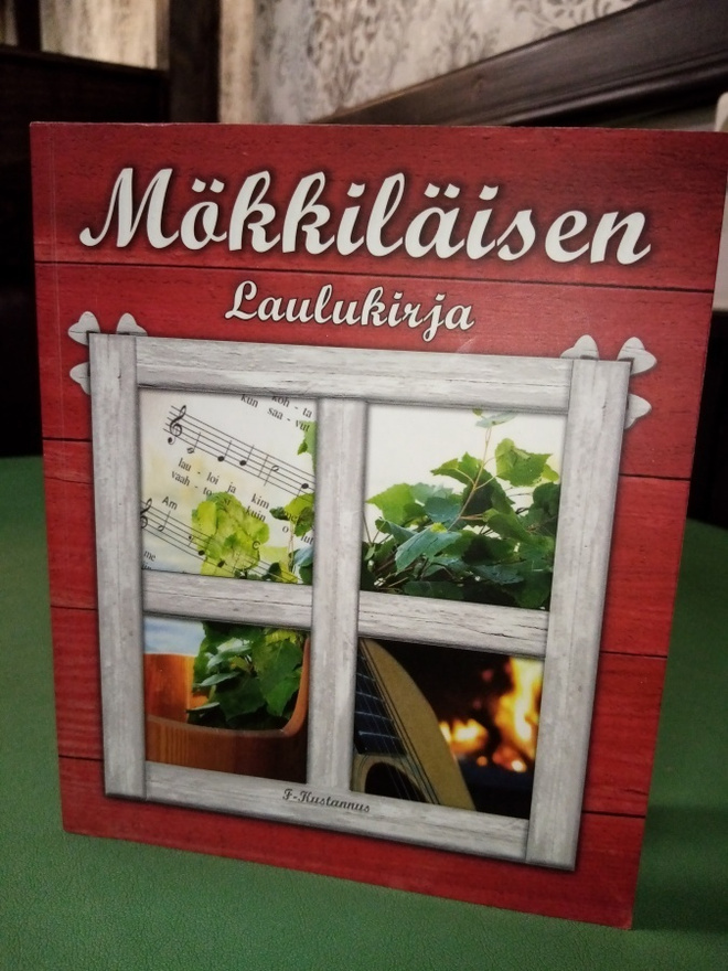 Mökkiläisen laulukirja ( SIS POSTIKULU  )