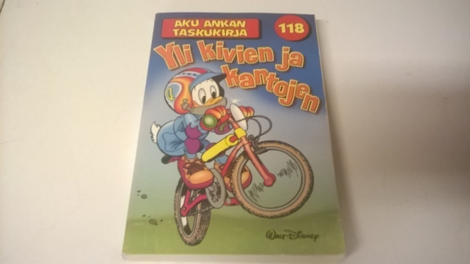 Aku Ankan taskukirja 118 Yli kivien ja kantojen