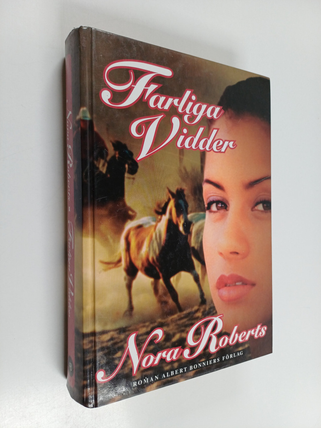 Nora Roberts : Farliga vidder - roman