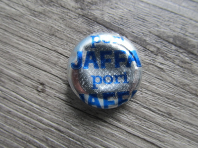 JAFFA, pori metallin vär. .....limsapullon "repäisykorkki".