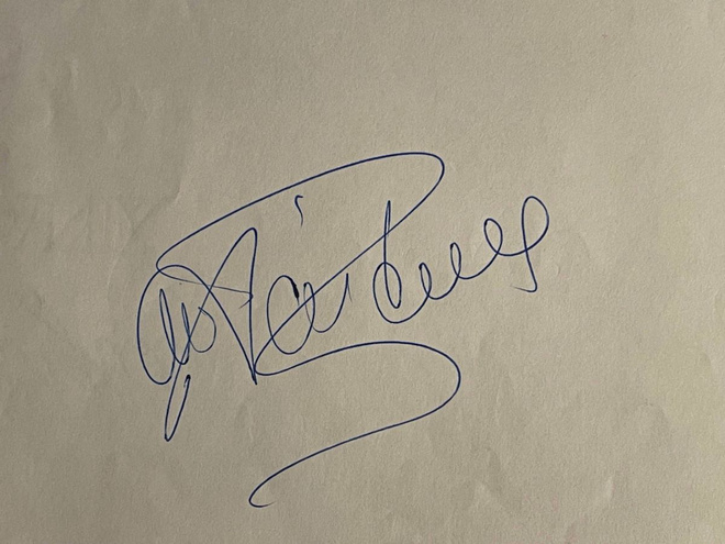 Frank Rijkaard nimikirjoitus paperilla
